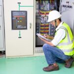 maintenance engineers inspect relay protection system bay control unit 2379 2232